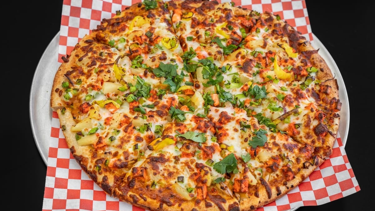 Indian spices on an Italian crust
