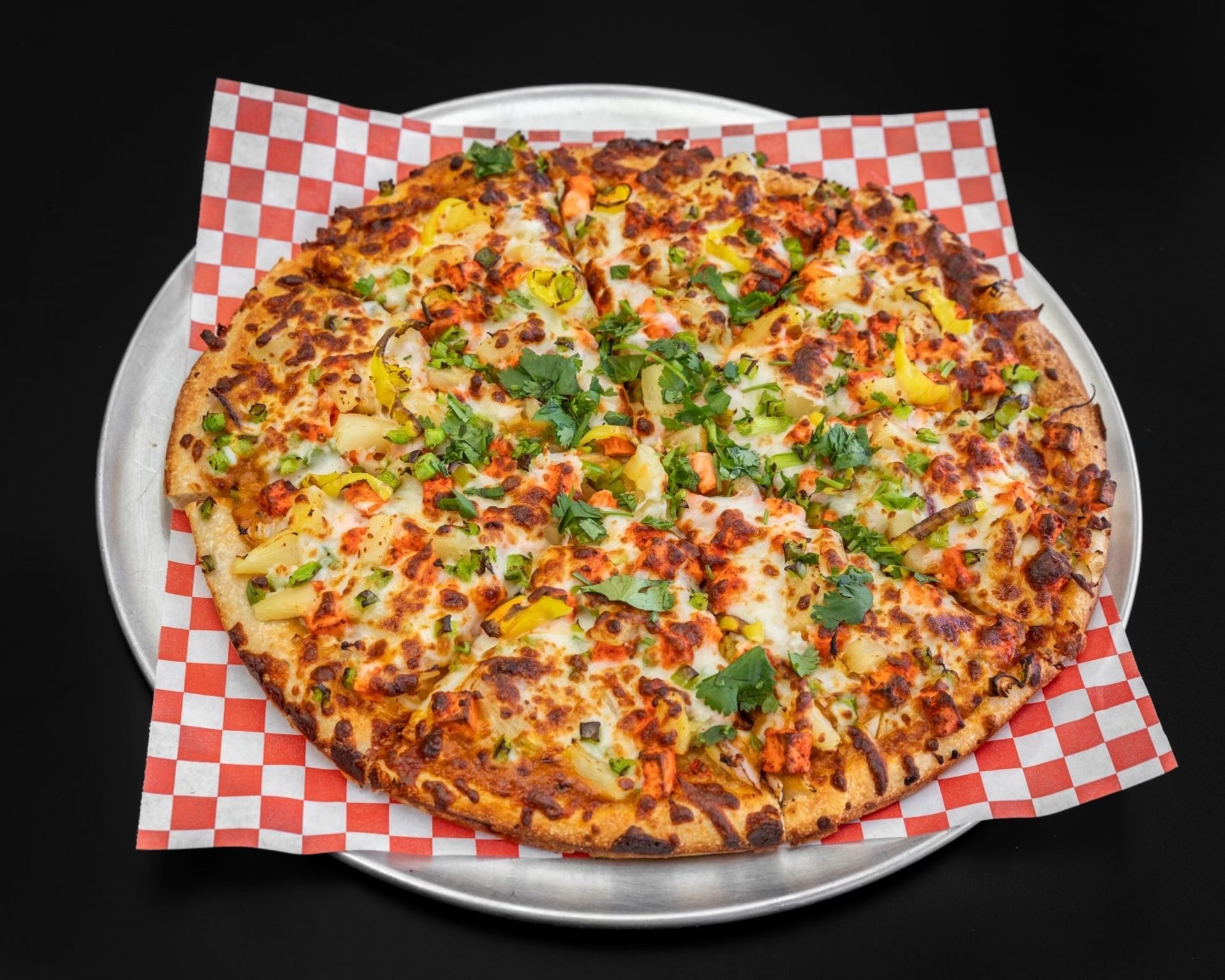 Indian spices on an Italian crust